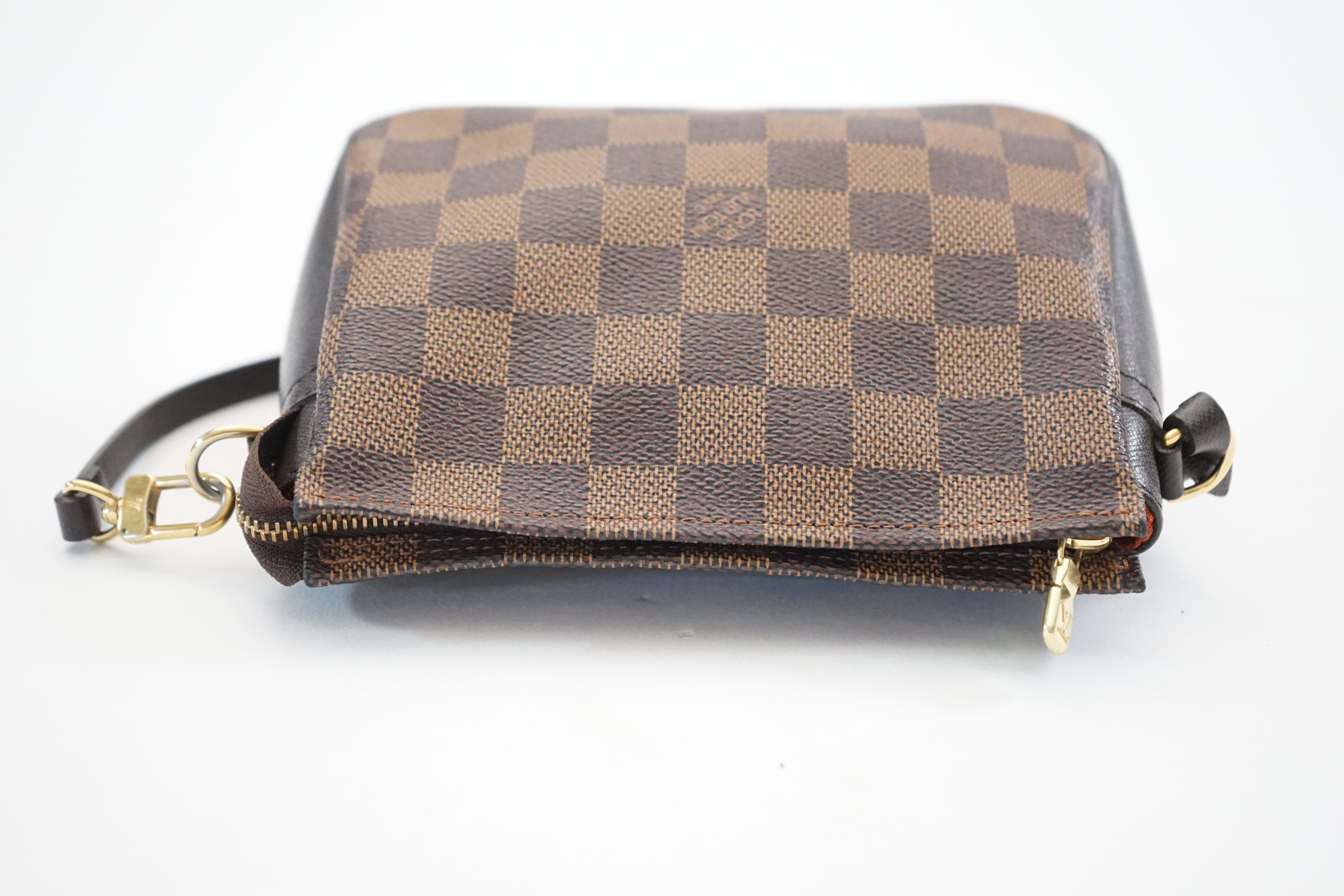 A Louis Vuitton Damier Ebene Pochette accessories bag, width 16cm, max depth 5cm, height 14cm